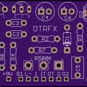 May include: A purple printed circuit board featuring white silkscreen labels including OTRFX, wARm-n-fUZZies v1.4, and various component designators like Q1, Q2, C1-C6, R1-R7, D1, D2, and B500K. The board includes multiple circular solder pads and traces.