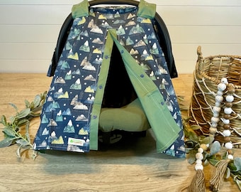 Mountain Baby Car Seat Cover: Blue Canopy with Green Accents