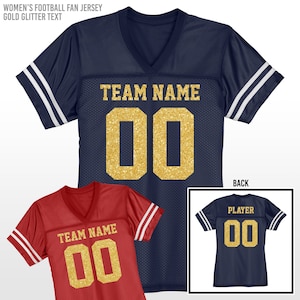 May include: Two navy blue and red football jerseys with white stripes on the sleeves. The jerseys have gold glitter text that reads "TEAM NAME" and "PLAYER" with the number "00" on the front and back.