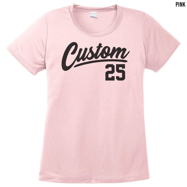 May include: Pink short-sleeved t-shirt with black text that says "Custom 25".