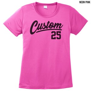 May include: Neon pink t-shirt with black text that says "Custom 25".
