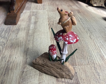 Mouse carved on a mushroom by Stuart Clark