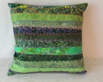 Throw Pillow in green prints. 16" square pillow.  Variety of green fabrics with decorative stitching. Decorative Pillow, Accent Pillow