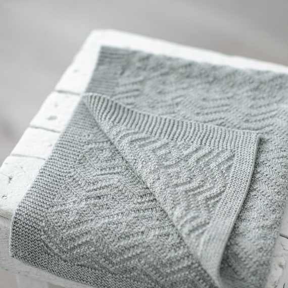 Grey knitted on sale baby blanket