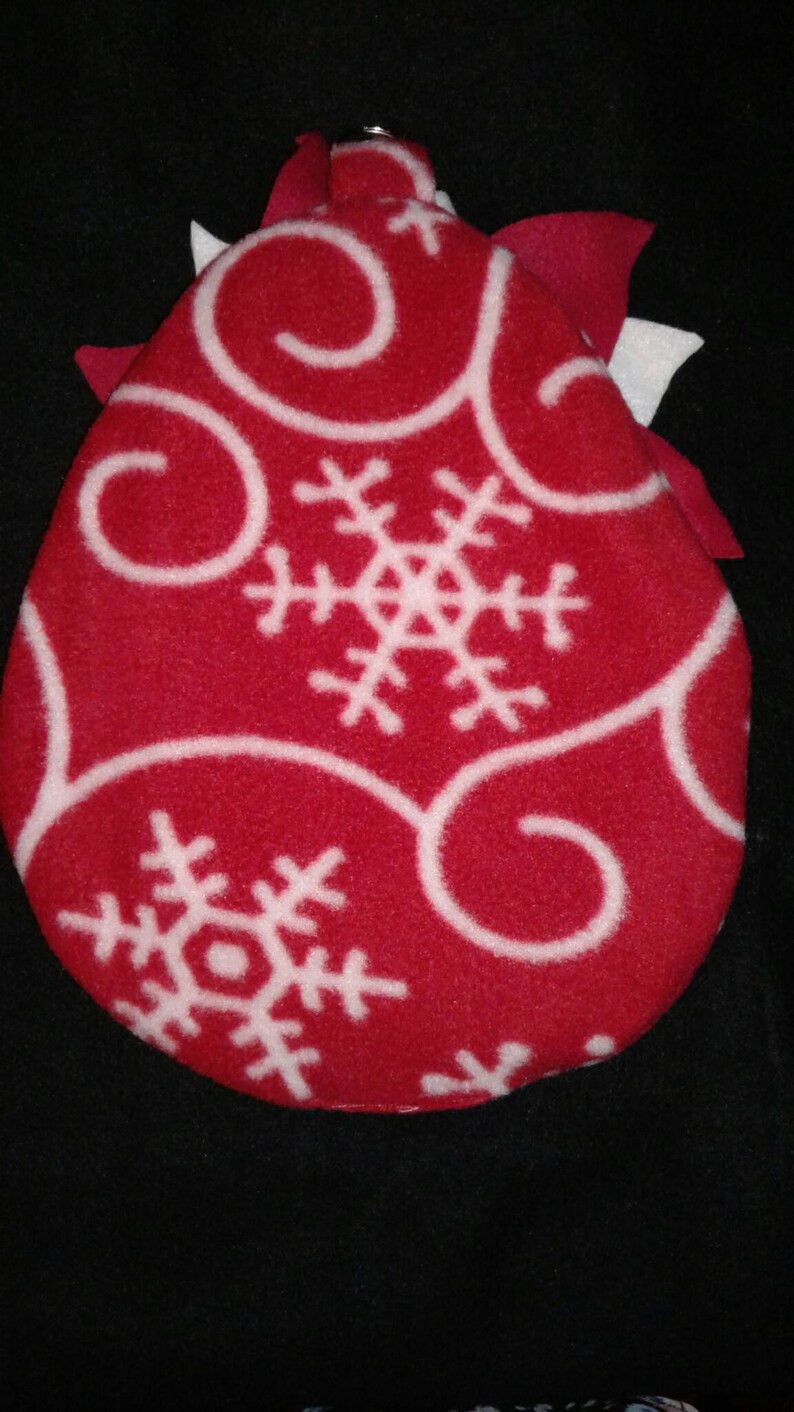 A Sugar glider egg shaped cage pouch with petals