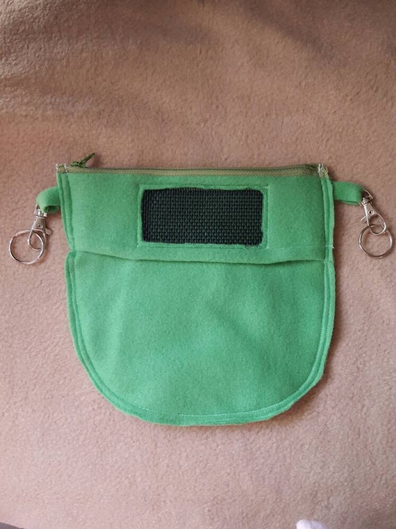 A Sugar glider egg shaped cage pouch with petals