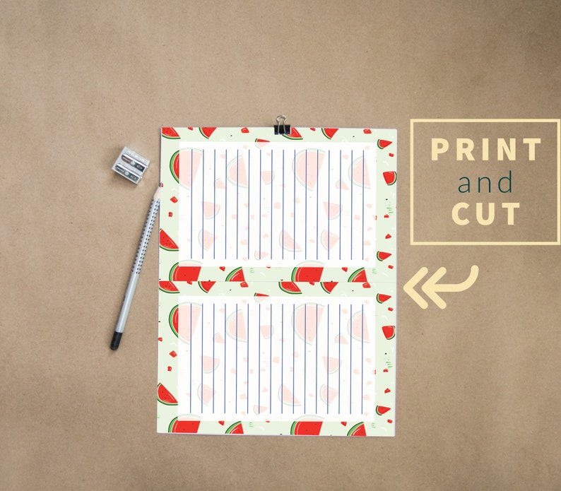 May include: Printable sheet of paper with a watermelon pattern border. The sheet is divided into two sections with lined paper inside. The text "PRINT and CUT" is visible in the upper right corner of the image.