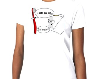 May include: White t-shirt featuring a cartoon toothbrush and toilet paper with speech bubbles. The toothbrush says, "I hate my job..." and the toilet paper replies, "Seriously?"