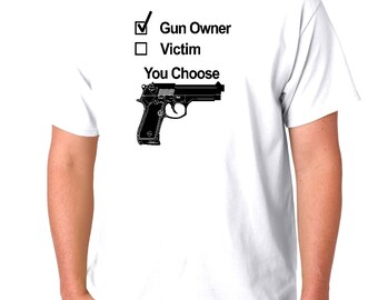 Víctima del propietario de la pistola que eliges Derechos de cheque Camiseta de manga corta premium Camiseta Top Regalo Pequeño - 3XL Envío Gratis Rifle Pistola Bullet