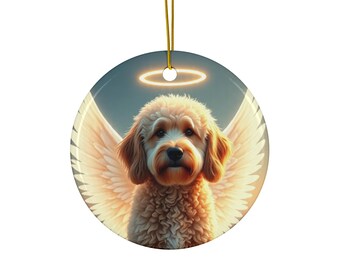 May include: Round ceramic ornament featuring a fluffy, light brown dog with angel wings and a halo. The dog has a sweet expression. The background is a soft blue with a gold hanging string. A heartwarming keepsake.