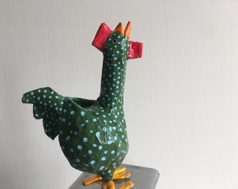 Small Easter rooster in green and blue sculpted paper.