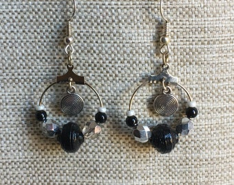 Small black and silver earrings. Rolled paper bead.