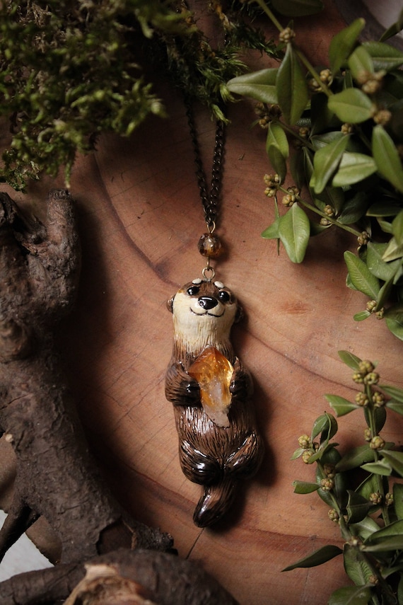 Tiny Otter compeled Holding Hands Pendant