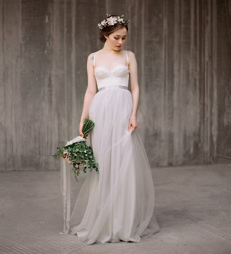 simple white wedding dress with grey belt