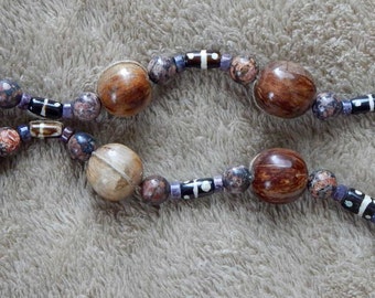30-40-22. Beaded necklace with seed, bone, ceramic and jasper beads.