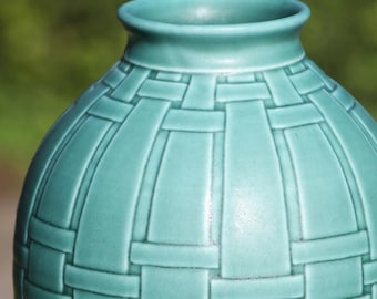 One of a kind Hand Carved 7 inch vase.  Modified Basket Geometric Pattern