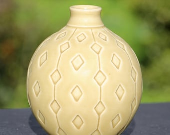 Hand Carved Porcelain Vase. Yellow wheat glaze