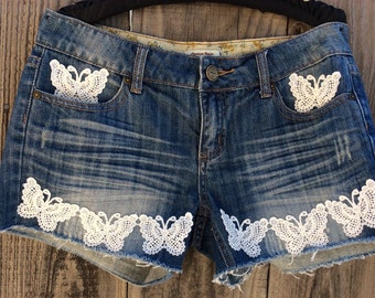 Embellished denim shorts.  Size 27 (USA Size 4)