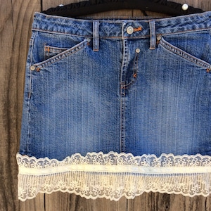 Embellished denim mini skirt.  Juniors size 7