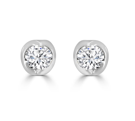 tension set diamond earrings