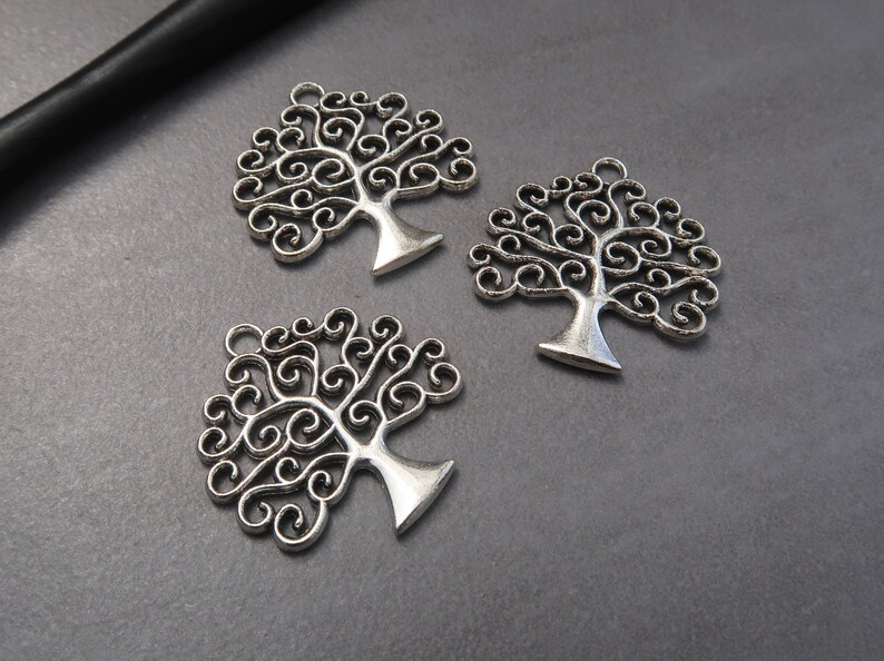 Celtic life tree pendant iggdrasil with spiral branches in silver or bronze brass 26x25 mm