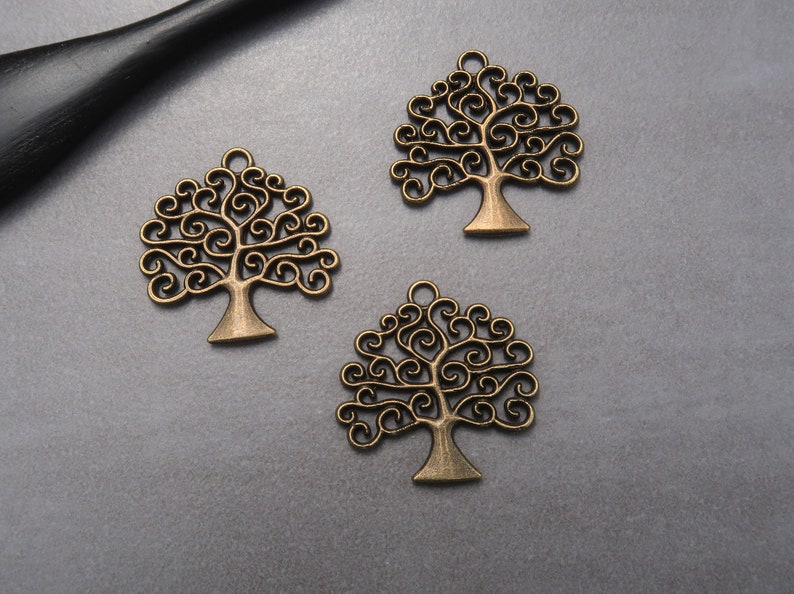 Celtic life tree pendant iggdrasil with spiral branches in silver or bronze brass 26x25 mm