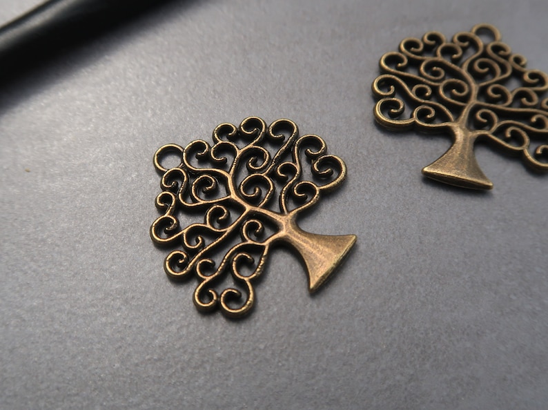Celtic life tree pendant iggdrasil with spiral branches in silver or bronze brass 26x25 mm