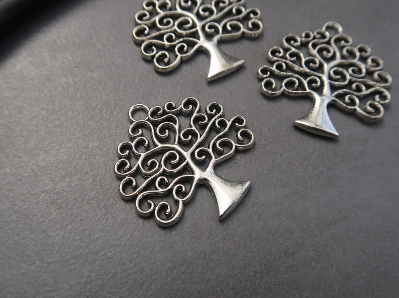 Celtic life tree pendant iggdrasil with spiral branches in silver or bronze brass 26x25 mm