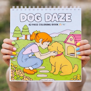 May include: A spiral-bound coloring book titled "DOG DAZE" with a cartoon illustration of a girl kissing a golden dog. The cover also features a dog house, trees, and the text "42 PAGE COLORING BOOK".