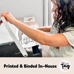 May include: A black and white spiral binding machine with a long white handle being used to bind a document with a printed illustration. The text Printed & Binded In-House and a logo with the text color with Tay are visible at the bottom.