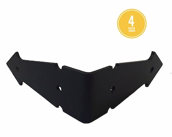 May include: Four pack of black metal corner brackets with a pointed arrow design. The brackets are designed to be used for decorative purposes.