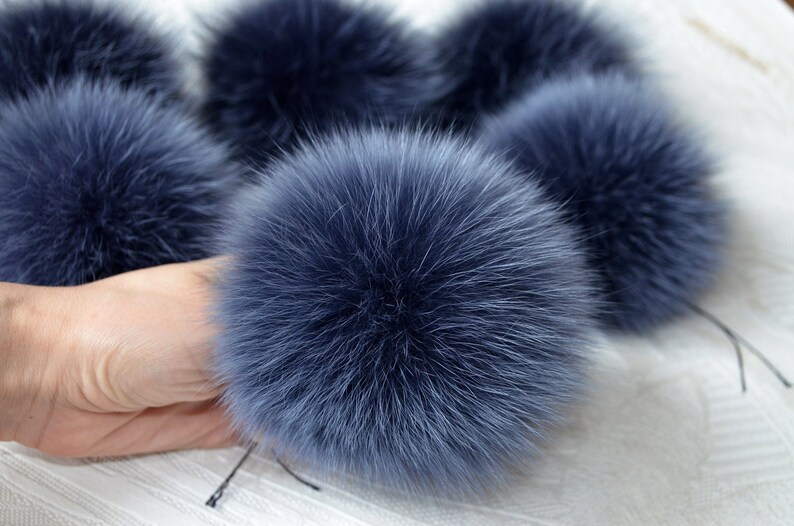 navy blue pom poms