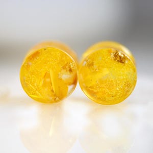 Yellow Ear Tunnels, Skeleton Leaf Plugs. Resin Plugs with Yellow Immortelle. Yellow Flower Plugs. Pressed Flower Plugs. Plugs and Tunnels.