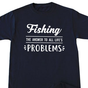 May include: A navy blue t-shirt with white text that reads "Fishing The Answer To All Life's Problems".