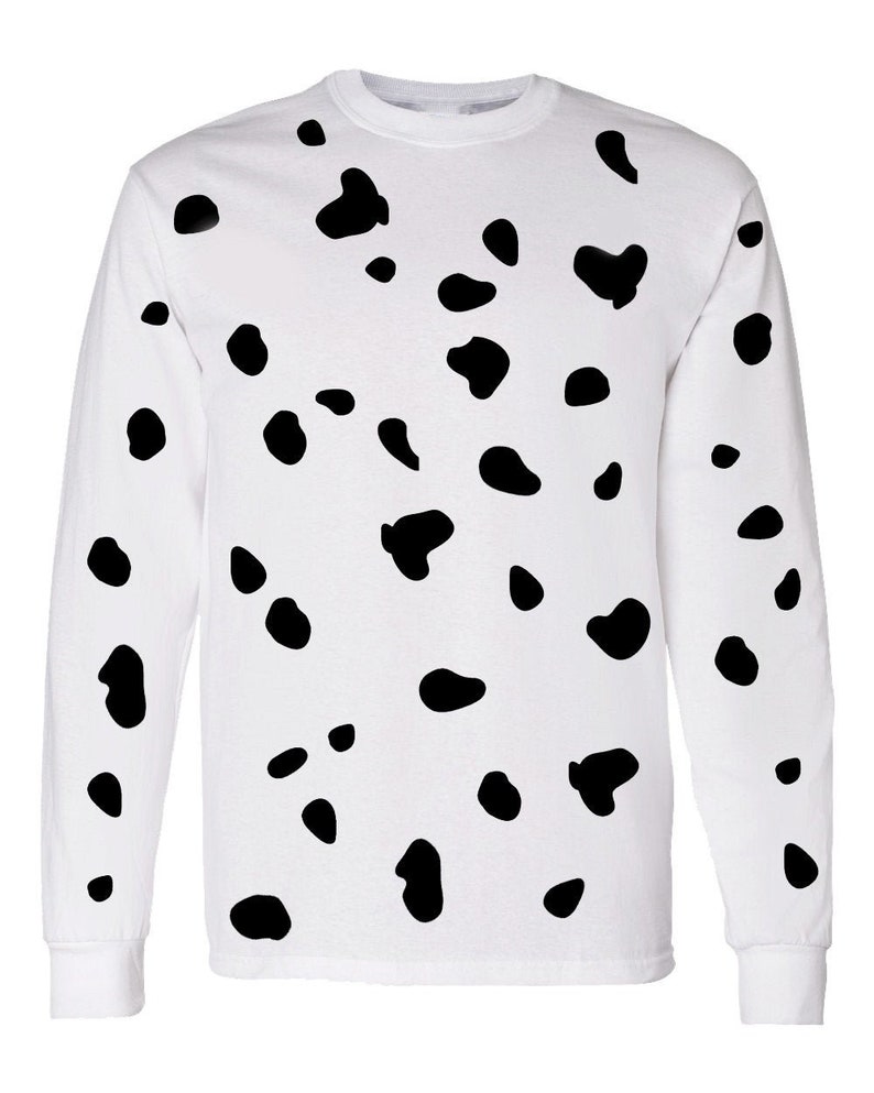 May include: White long-sleeved t-shirt with a black dalmatian spot pattern.