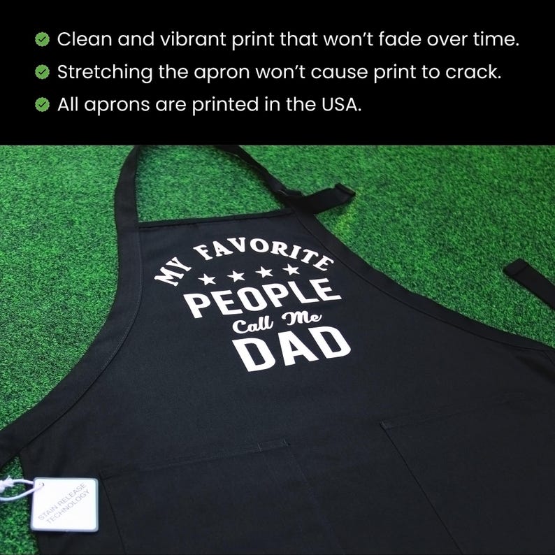 May include: Black apron with white text that reads "My Favorite People Call Me Dad" with four stars above the word "People".