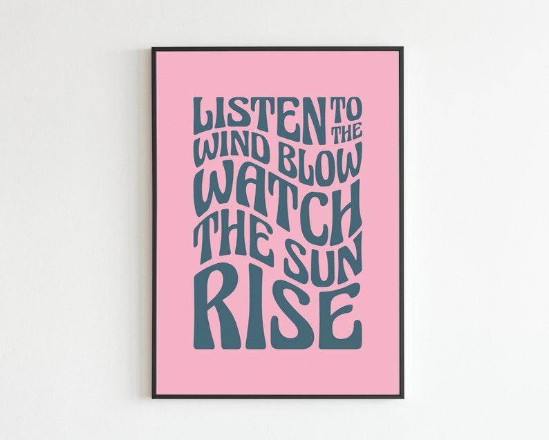 May include: A pink poster with a dark blue text overlay that reads "Listen to the wind blow watch the sun rise".
