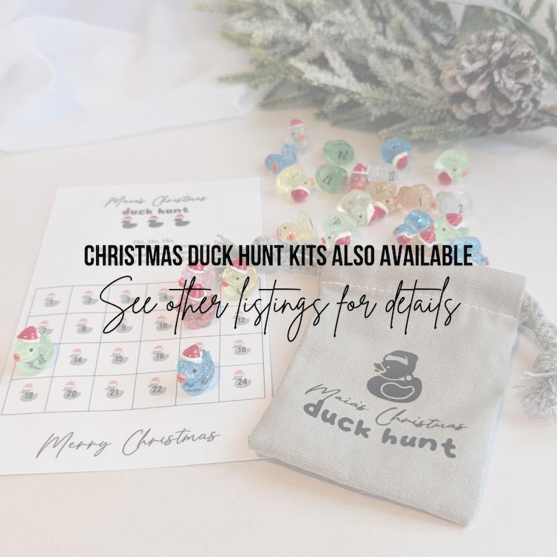 May include: A Christmas duck hunt kit featuring a calendar, duck figurines, and a drawstring bag. The calendar has numbered squares with duck figurines. The bag has a duck logo and the text "Maias Christmas duck hunt". Text on the image reads "Christmas Duck Hunt Kits Also Available".