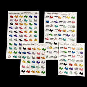 May include: A sheet of colorful printer sticker labels with a design of a printer. The stickers are arranged in rows and columns. The text "PRINT" and "INSERT" are printed on the stickers.