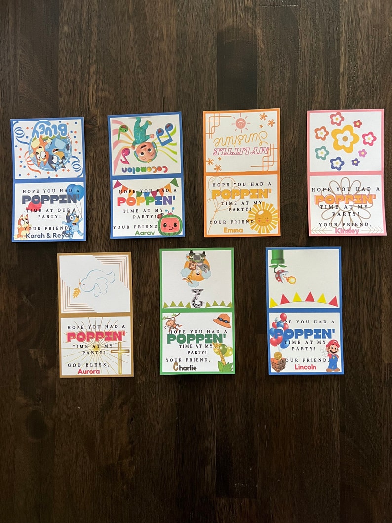 May include: Ten colourful thank you cards with cartoon characters and the text "Hope you had a poppin' time at my party!"  Each card has a different character and the name of the friend who hosted the party.