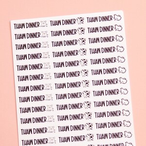 May include: A sheet of white stickers with the text "THAW DINNER" repeated multiple times. Each sticker features a small black and white cow illustration.
