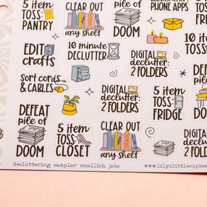 May include: A set of colourful stickers with decluttering tips and tasks. The stickers feature phrases like "5 item toss: pantry", "clear out any shelf", "defeat pile of doom", and "digital declutter: 2 folders".