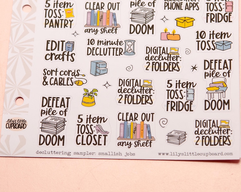 May include: A set of colourful stickers with decluttering tips and tasks. The stickers feature phrases like "5 item toss: pantry", "clear out any shelf", "defeat pile of doom", and "digital declutter: 2 folders".