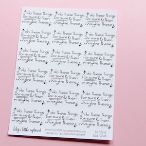 May include: A sheet of white stickers with black handwritten text. The stickers read "do these things for sure & then maybe these." The stickers are arranged in rows and columns. The bottom of the sheet has the shop's name and website.