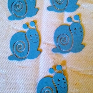 Conjunto 5 caracóis perfurados - scrapbooking