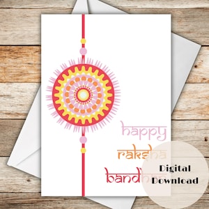Puede incluir: Tarjeta de felicitación blanca con un diseño de mandala colorido en tonos rojos, amarillos y rosas. La tarjeta incluye las palabras "happy raksha bandhan" en letras estilizadas. Descarga digital disponible.