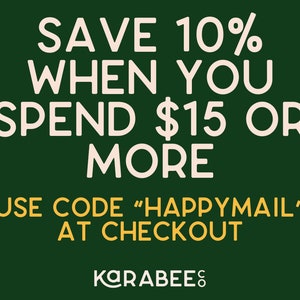 May include: Green background with white text that reads "SAVE 10% WHEN YOU SPEND $15 OR MORE USE CODE "HAPPYMAIL" AT CHECKOUT" and a yellow logo that reads "KARABEES".