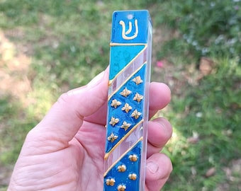 Blue and turquoise ,modern Mezuzah case partly transparent.