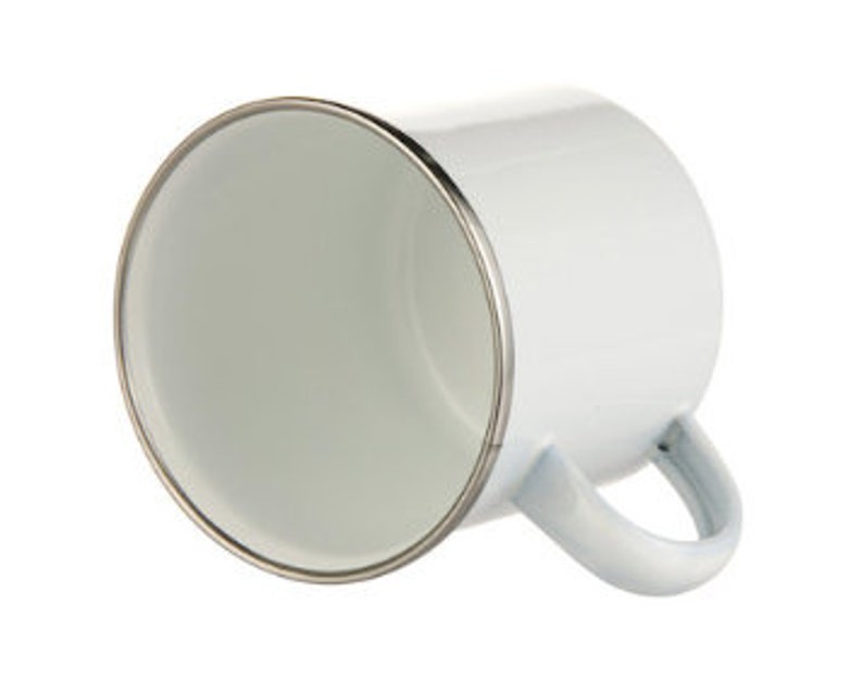 May include: White enamel mug with a silver rim and a white handle.