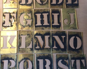 Antique brass alphabet stencils